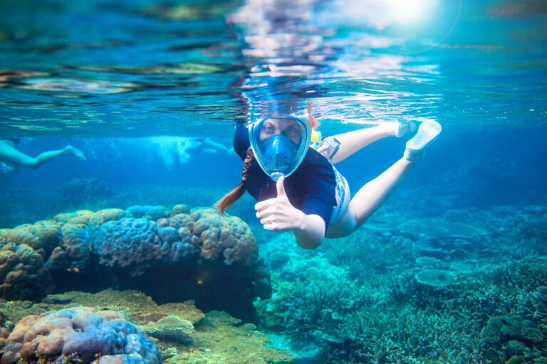 Young,Woman,Snorkeling,Undersea.,Snorkel,Show,Thumb,Up,Under,Water